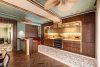 Terrazzo Granitech resin microtopping with Armourcoat satin PU sealer on kitchen ceiling and walls.